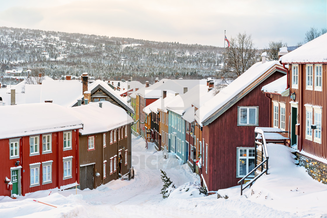 "Colorful building facades at a street covered in snow during win" by Stefan Holm - $6.32 "Colorful building facades at a street covered in snow during win" stock image