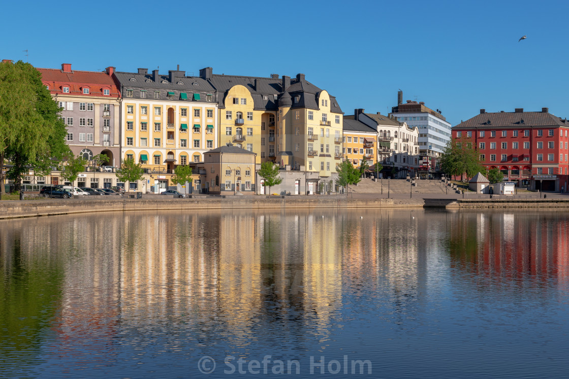 "Old colorful houses reflected in the Södertalje channel during" by Stefan Holm - $6.32 "Old colorful houses reflected in the Södertalje channel during" stock image