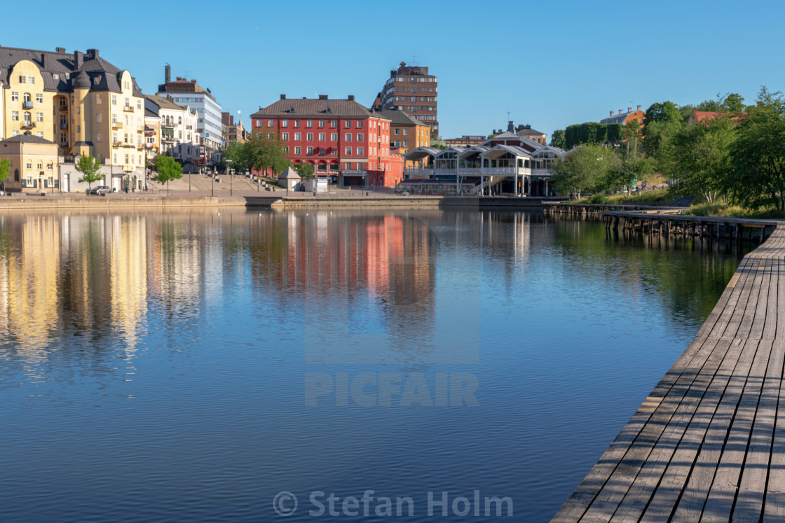 "Old colorful houses reflected in the Södertalje channel during" by Stefan Holm - $6.35 "Old colorful houses reflected in the Södertalje channel during" stock image