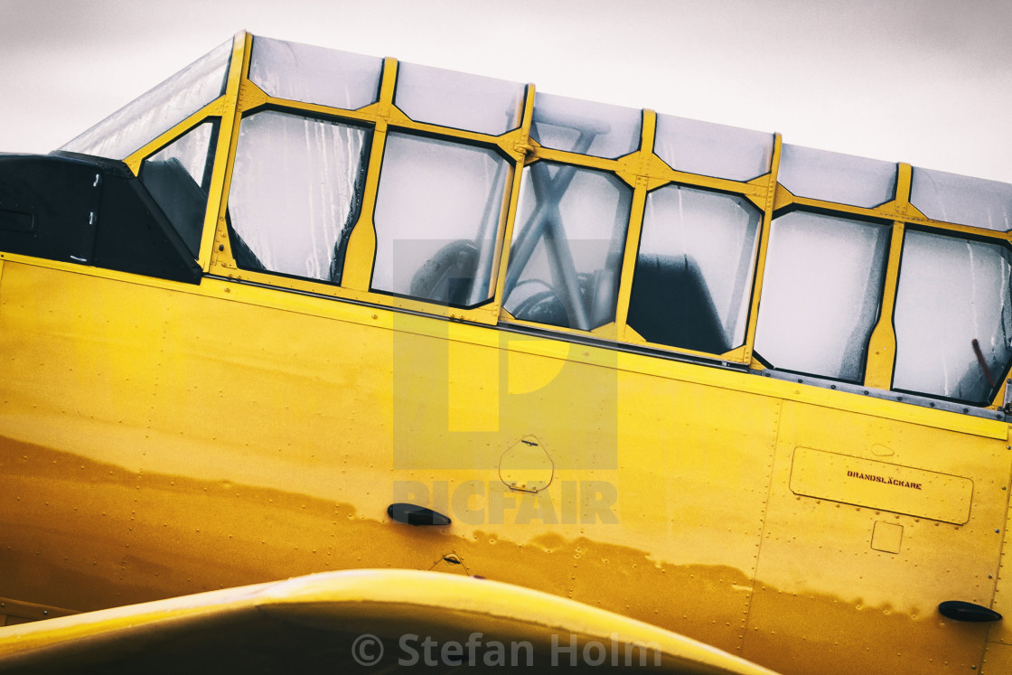 "Yellow SK 16 aeroplane at the airshow at Orebro airport" by Stefan Holm - $6.34 "Yellow SK 16 aeroplane at the airshow at Orebro airport" stock image
