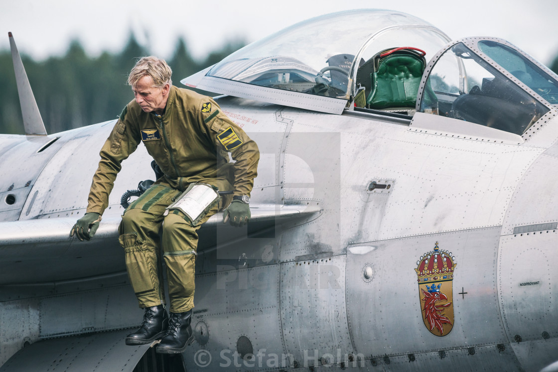 "J 29 Tunnan after landing with the pilot stepping out in the air" by Stefan Holm - $6.30 "J 29 Tunnan after landing with the pilot stepping out in the air" stock image