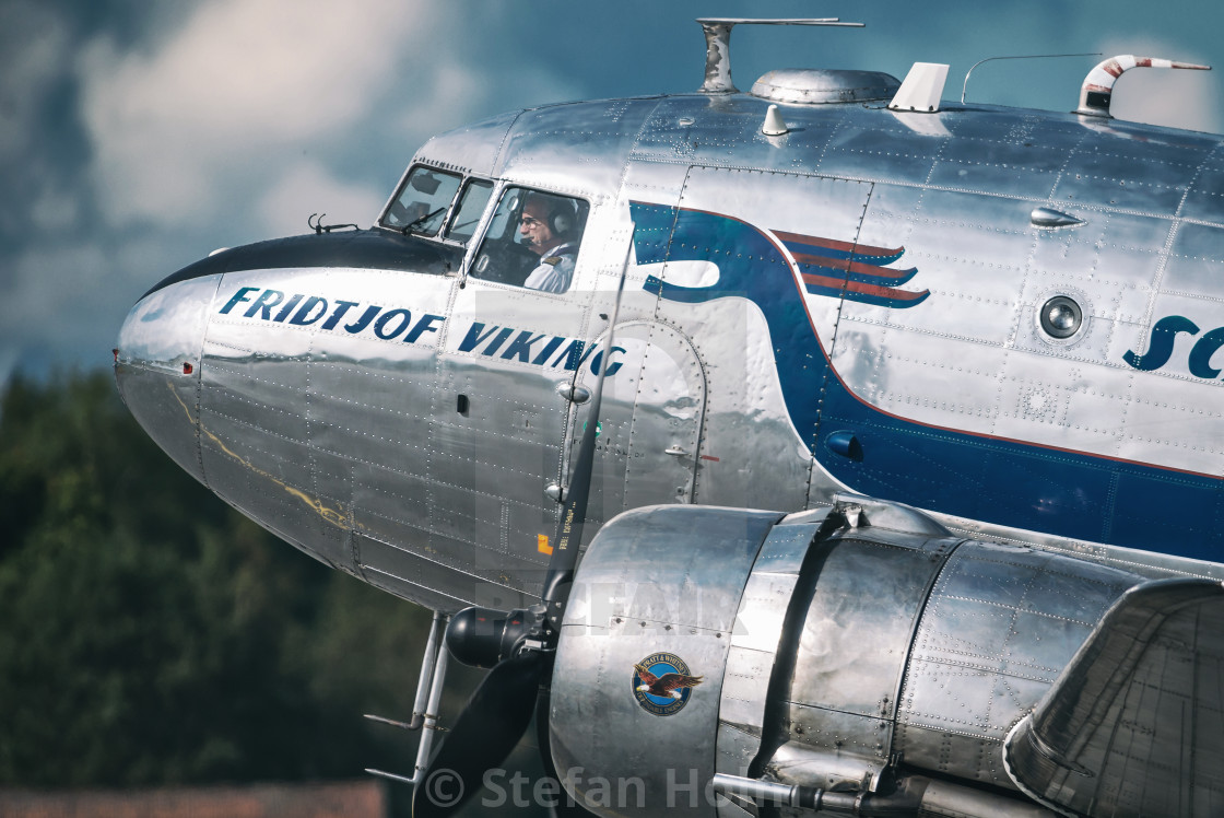 "DC 3 Daisy in metallic at the airshow at Orebro airport" by Stefan Holm - $6.34 "DC 3 Daisy in metallic at the airshow at Orebro airport" stock image