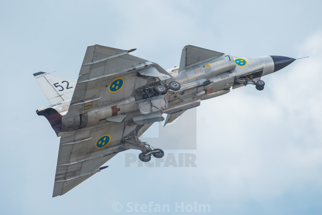"Takeoff with the AJS 37 Viggen in the airshow at Orebro airport" by Stefan Holm - $6.29 "Takeoff with the AJS 37 Viggen in the airshow at Orebro airport" stock image