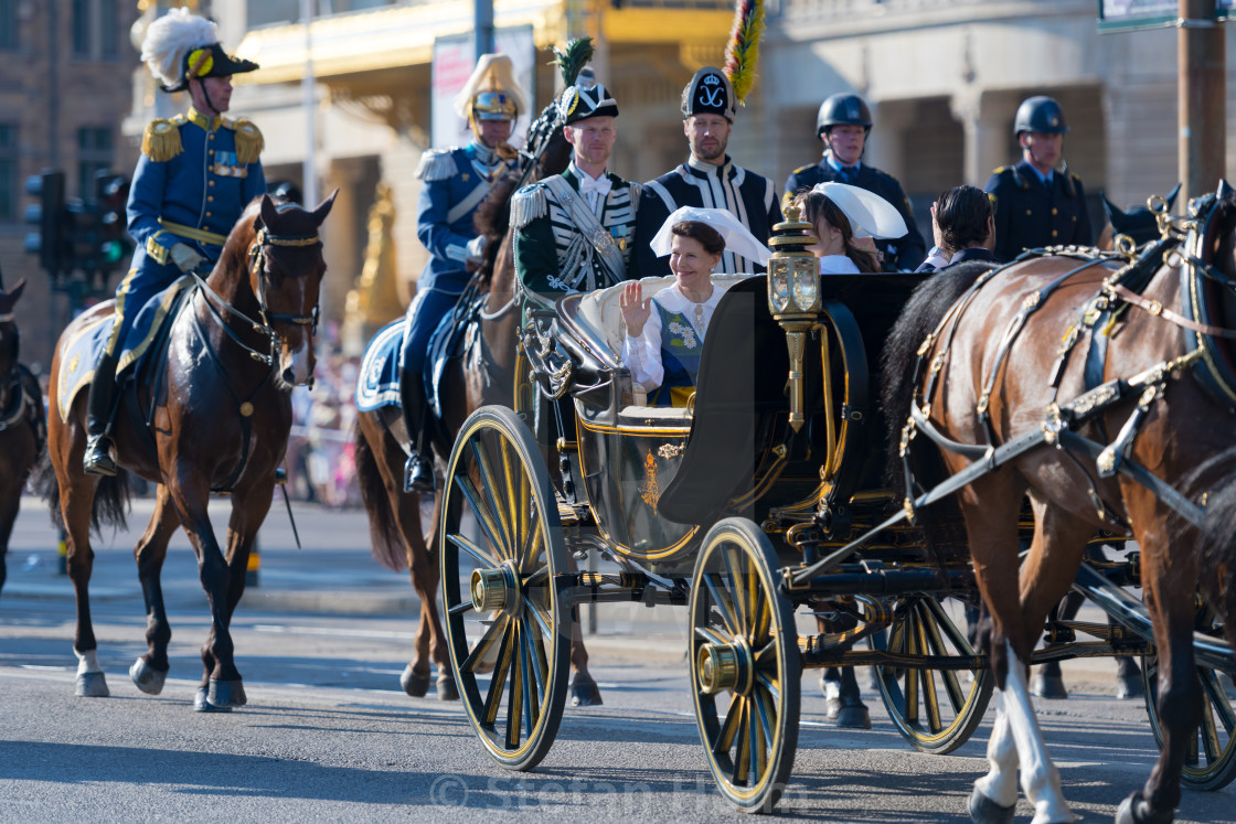 "The carriage with the Queen Silvia and Princess Sofia waving the" by Stefan Holm - $6.32 "The carriage with the Queen Silvia and Princess Sofia waving the" stock image