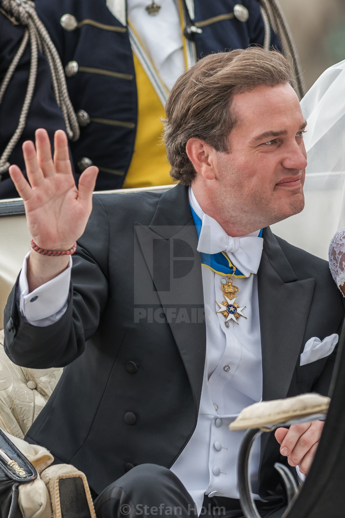 "Chris O´Neill waving his hand in a carriage on the way to Riddarholmen after the wedding" by Stefan Holm - $6.32 "Chris O´Neill waving his hand in a carriage on the way to Riddarholmen after the wedding" stock image