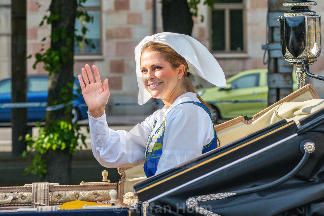 "Royal cortege with Princess Madeleine waving" by Stefan Holm - $6.31 "Royal cortege with Princess Madeleine waving" stock image