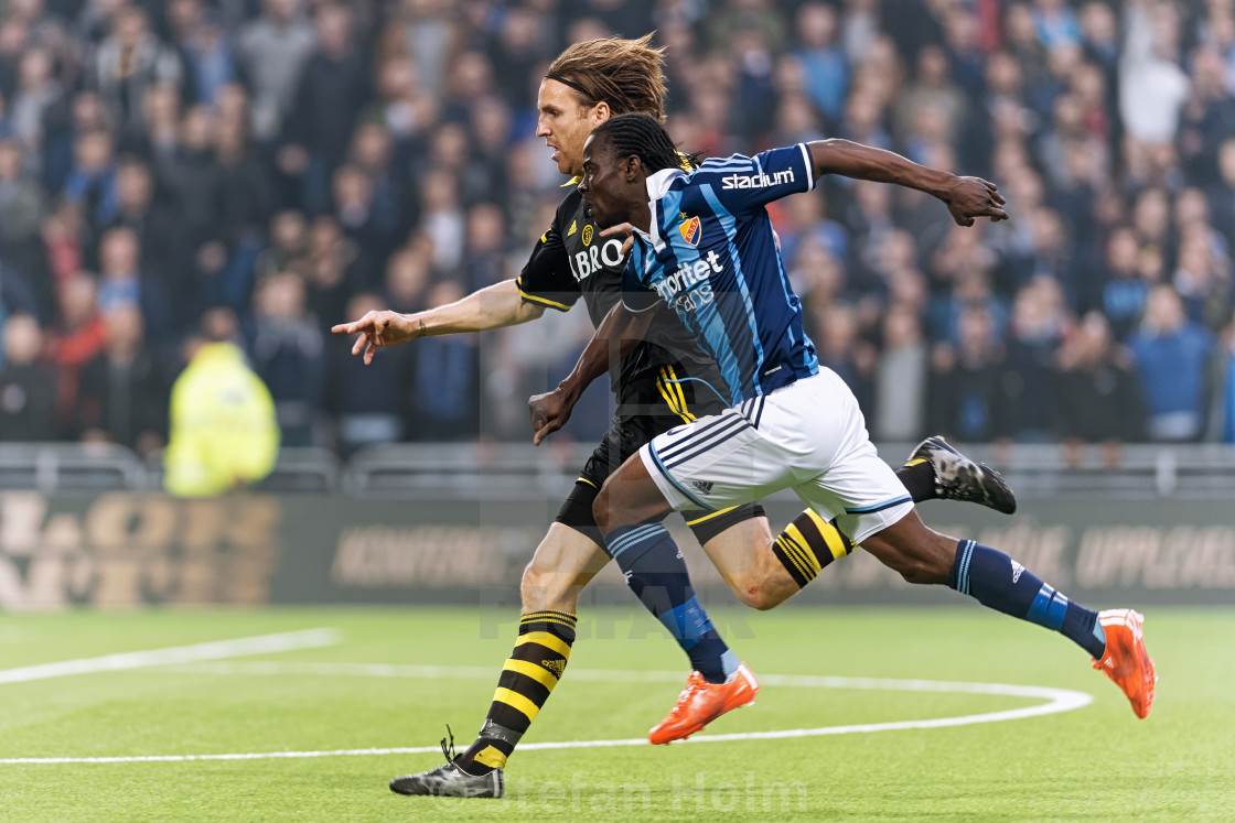 "Two players chasing the ball in the soccer game DIF vs AIK at Te" by Stefan Holm - $6.29 "Two players chasing the ball in the soccer game DIF vs AIK at Te" stock image
