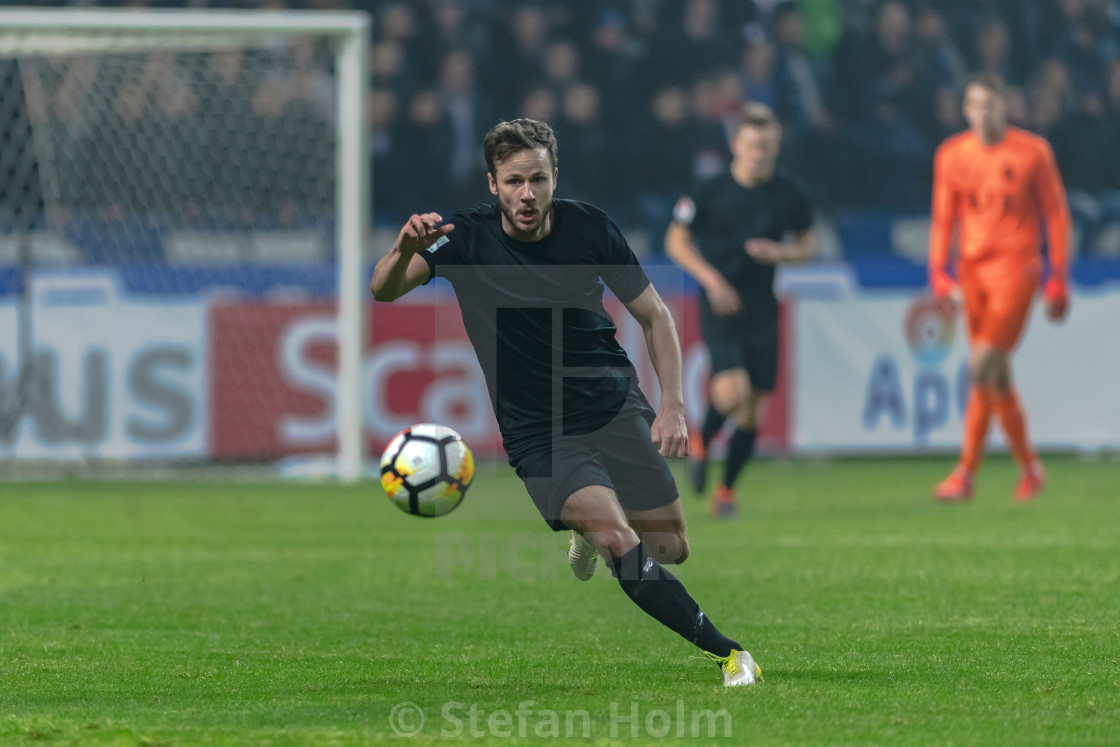 "AIK defender at the Svenska cupen semifinal" by Stefan Holm - $6.30 "AIK defender at the Svenska cupen semifinal" stock image