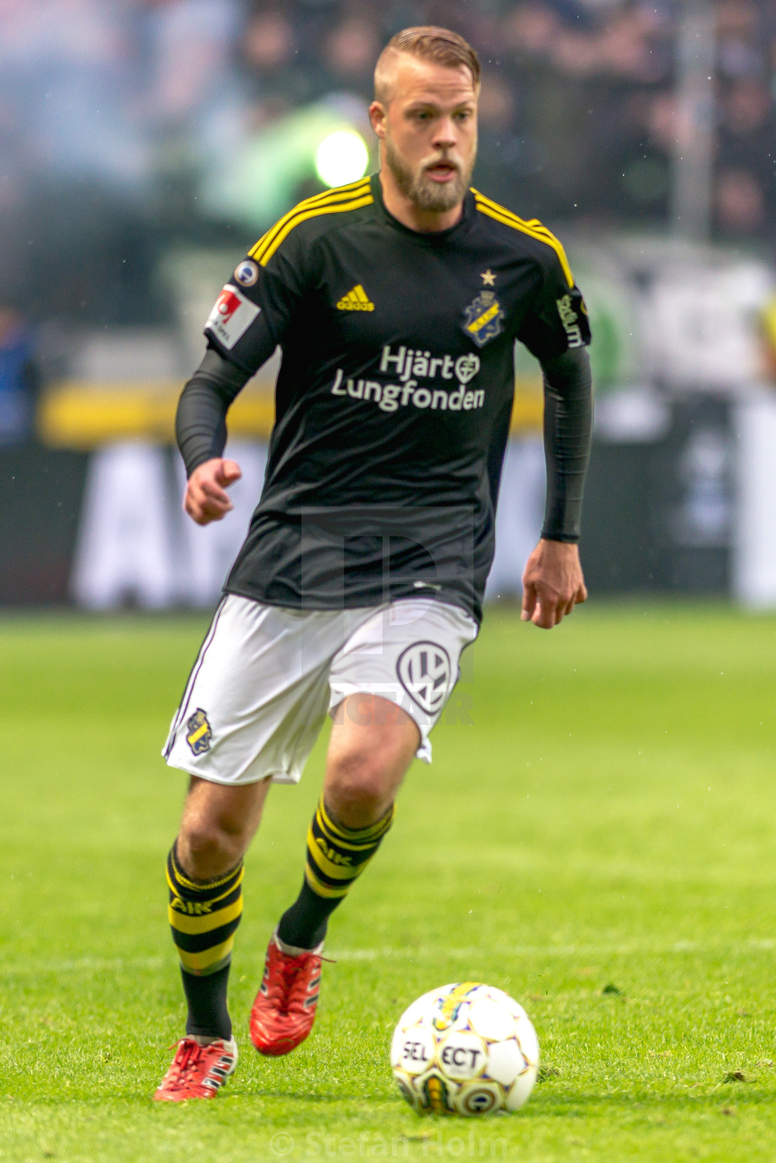 "Daniel Sundgren at the derby game between AIK and Hammarby IF at" by Stefan Holm - $6.31 "Daniel Sundgren at the derby game between AIK and Hammarby IF at" stock image