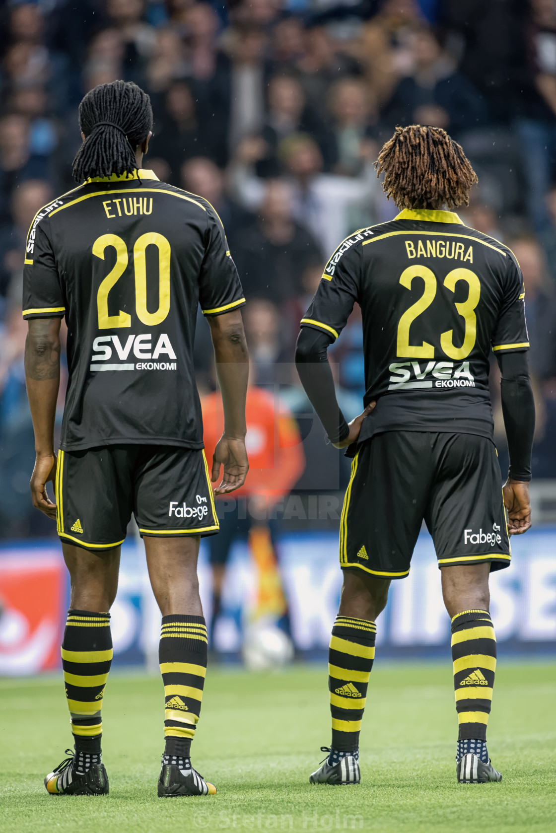 "The backs of Bangura and Etuhu in the game of DIF against AIK at" by Stefan Holm - $6.32 "The backs of Bangura and Etuhu in the game of DIF against AIK at" stock image