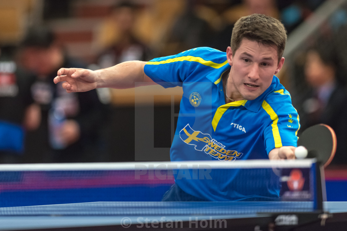 "Kristian Karlsson (Sweden) against Feng Bo (China) at the table" by Stefan Holm - $6.34 "Kristian Karlsson (Sweden) against Feng Bo (China) at the table" stock image