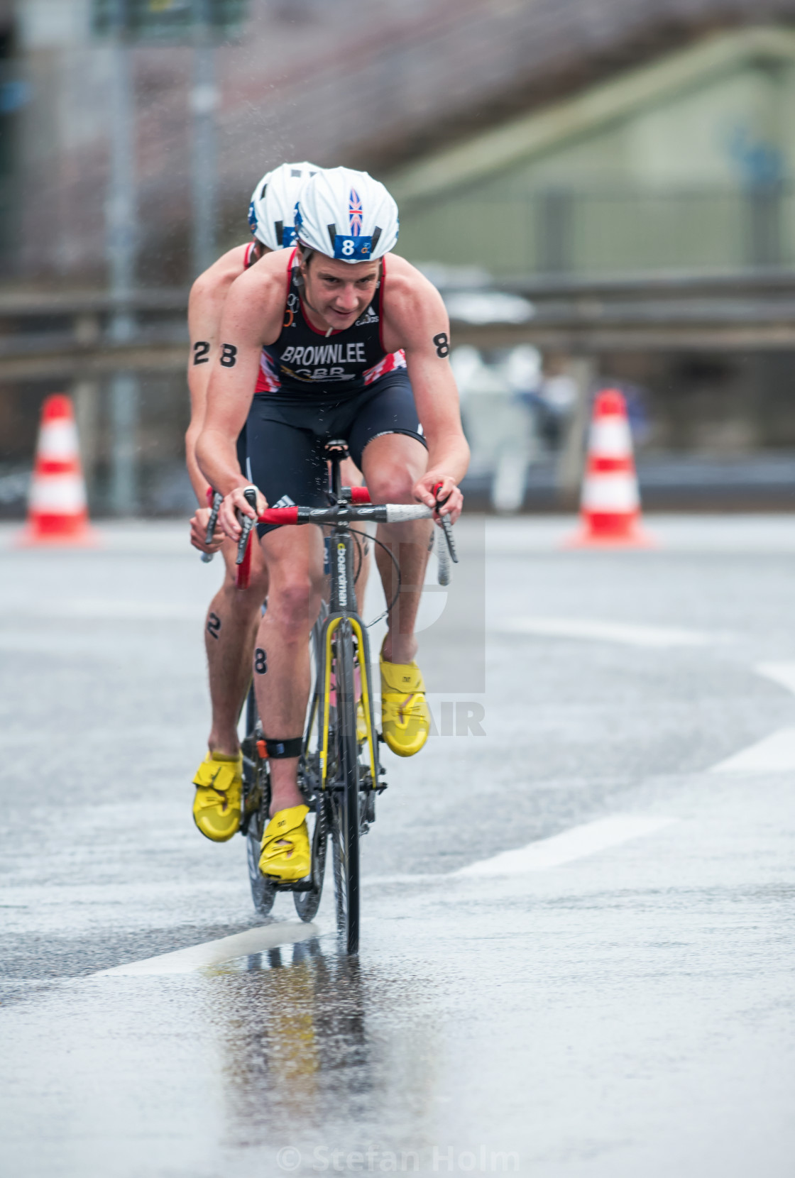 "Alitstair Brownlee with Jonathan on slipstream in the bad weathe" by Stefan Holm - $6.32 "Alitstair Brownlee with Jonathan on slipstream in the bad weathe" stock image