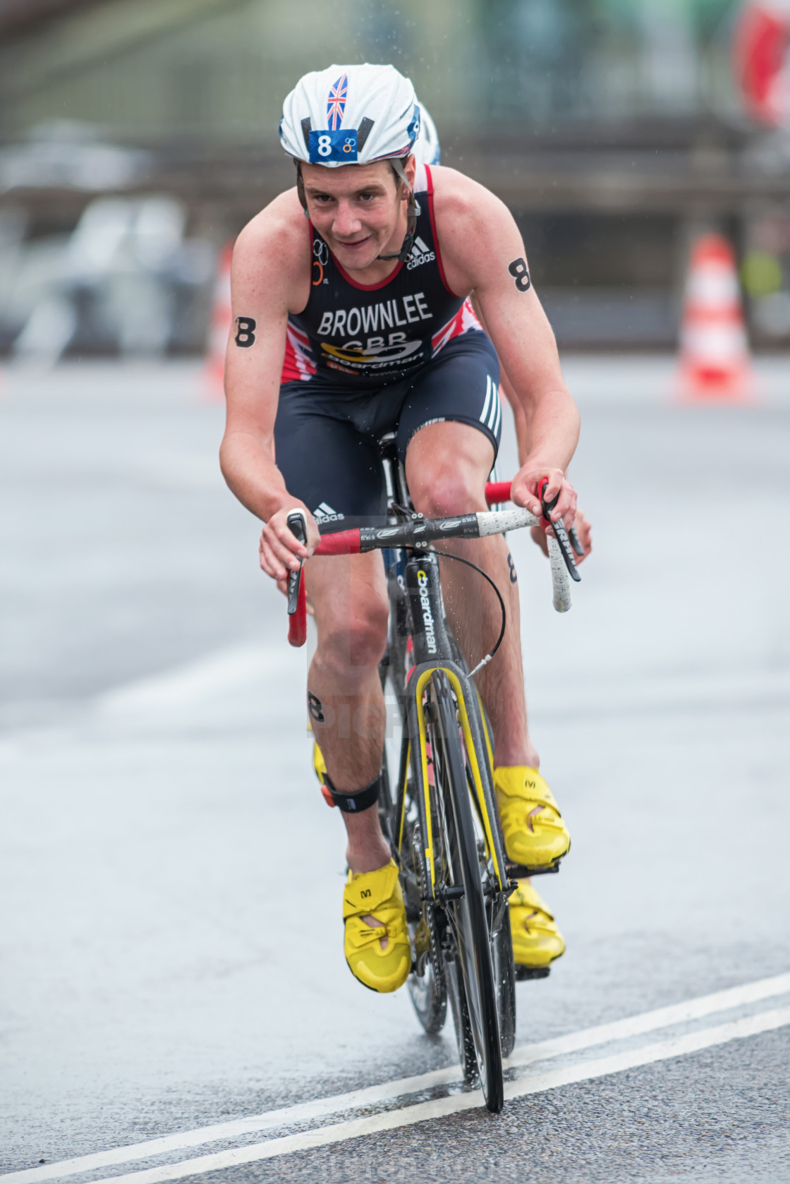 "Alitstair Brownlee with Jonathan on slipstream into a curve in t" by Stefan Holm - $6.32 "Alitstair Brownlee with Jonathan on slipstream into a curve in t" stock image