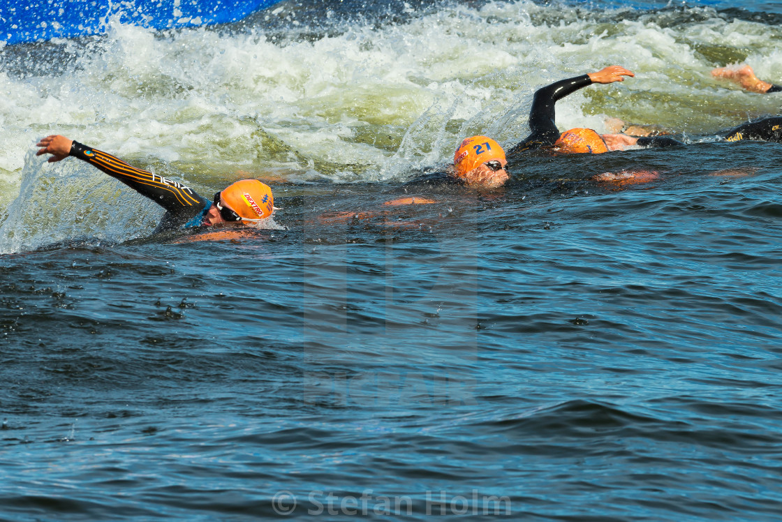 "STOCKHOLM - AUG, 24: Just after the start ot the swimming in the" by Stefan Holm - $6.32 "STOCKHOLM - AUG, 24: Just after the start ot the swimming in the" stock image