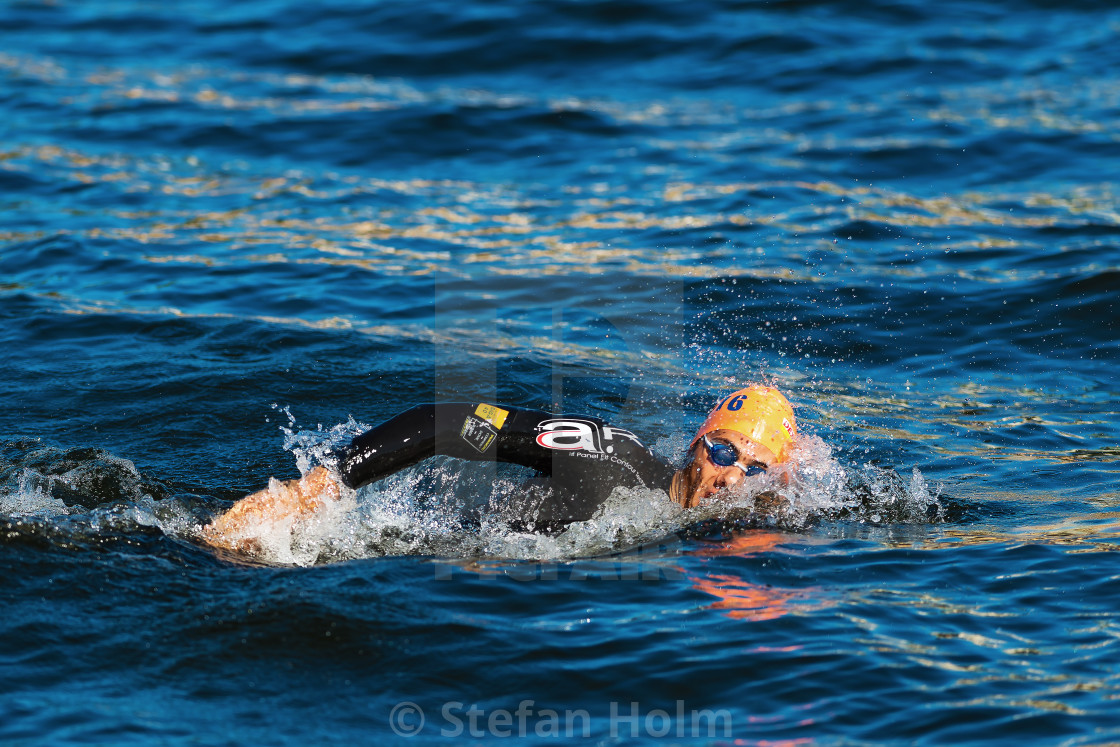 "Warm up swimming by Aurelien Raphael (FRA) in the cold water" by Stefan Holm - $6.30 "Warm up swimming by Aurelien Raphael (FRA) in the cold water" stock image