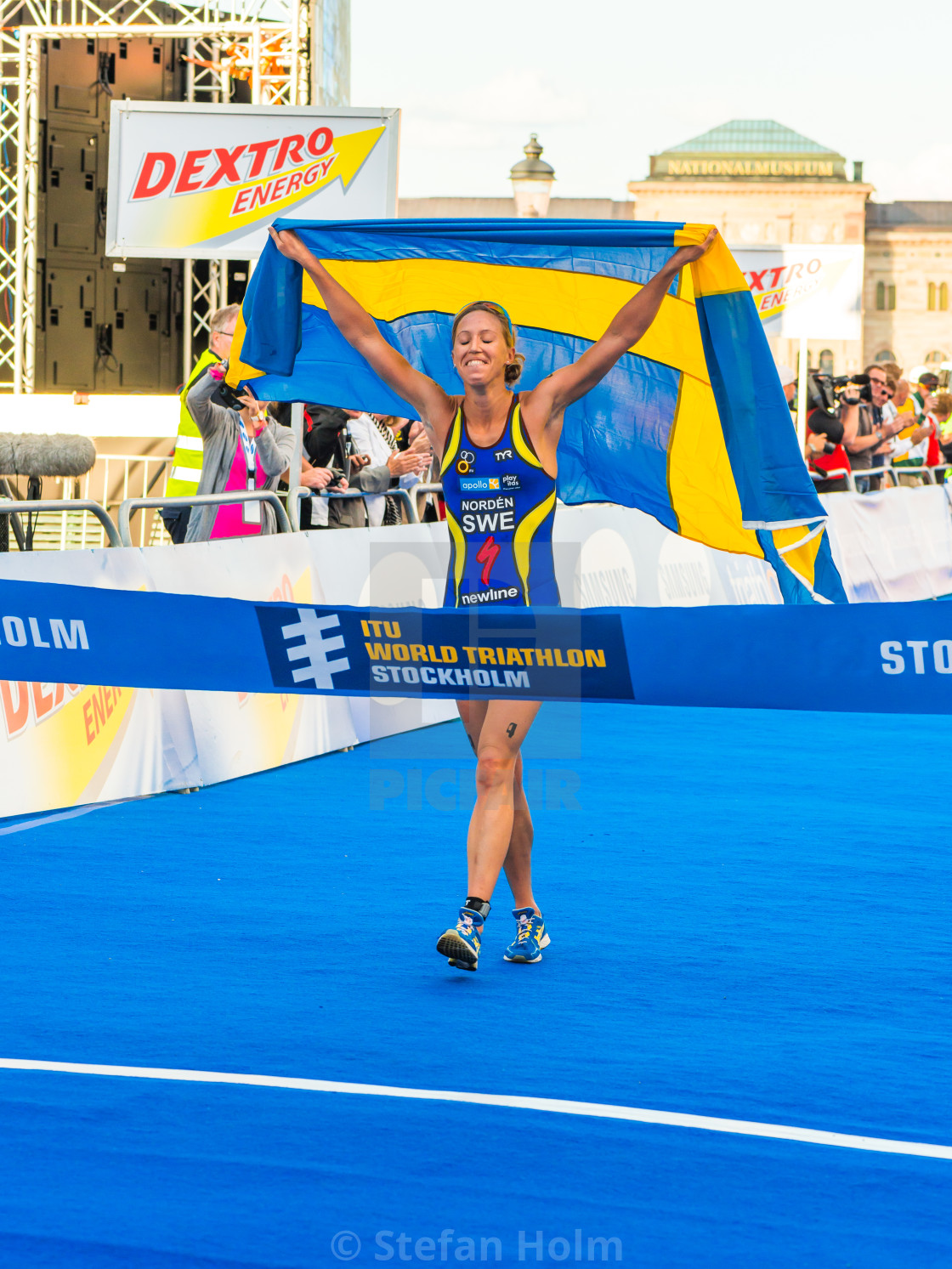 "Stockholm - Lisa Nordén at the finishline, Swedish flag, Crying" by Stefan Holm - $6.35 "Stockholm - Lisa Nordén at the finishline, Swedish flag, Crying" stock image