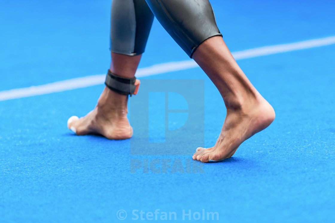 "Triathlete feet passing by at the Mens ITU World Triathlon" by Stefan Holm - $6.29 "Triathlete feet passing by at the Mens ITU World Triathlon" stock image