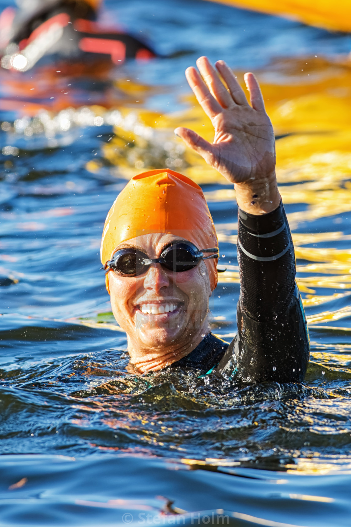 "Happy woman with orange cap waiting for the start at the Womens" by Stefan Holm - $6.31 "Happy woman with orange cap waiting for the start at the Womens" stock image