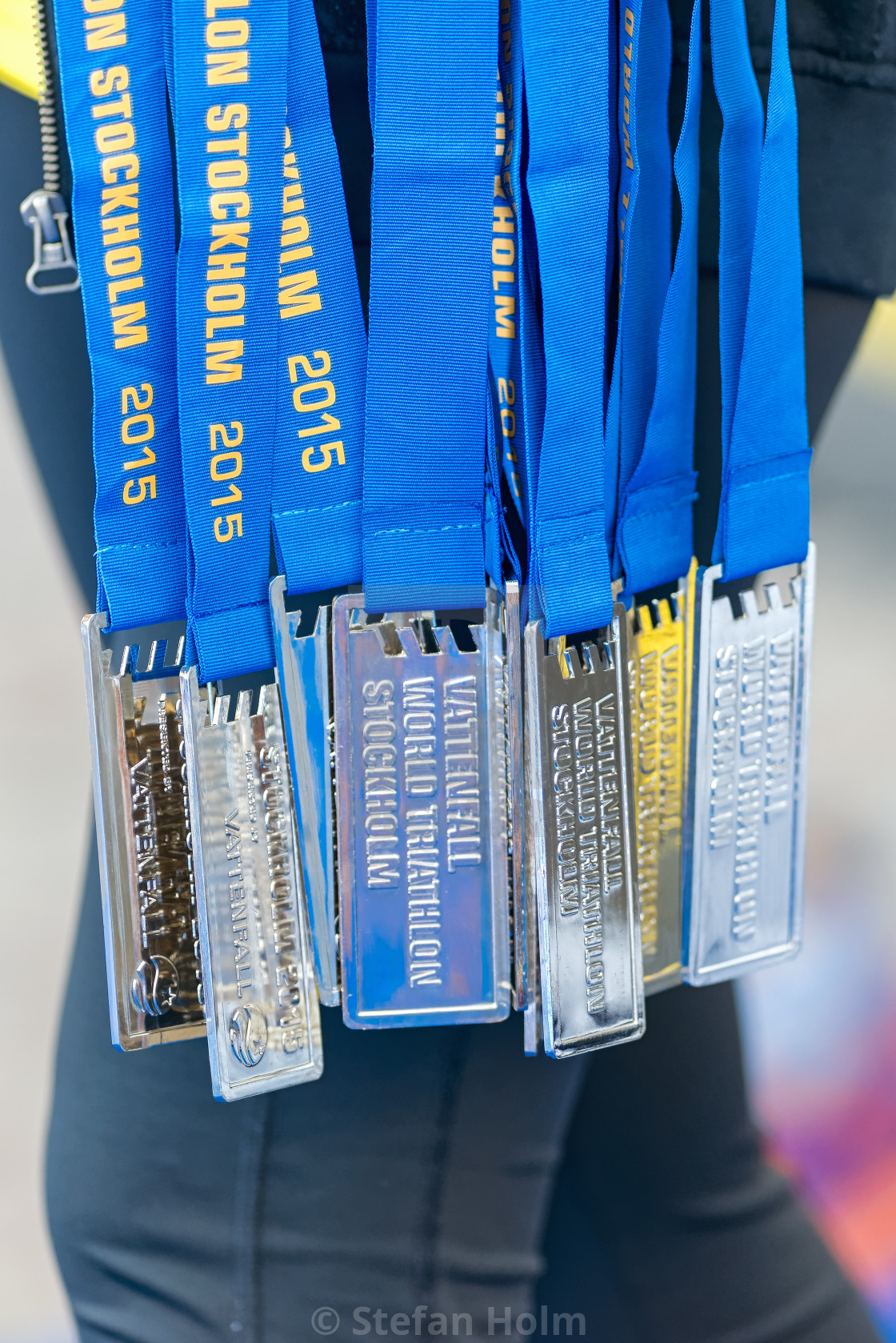 "Medals to all trialthletes who finish the race at the ITU World" by Stefan Holm - $6.30 "Medals to all trialthletes who finish the race at the ITU World" stock image