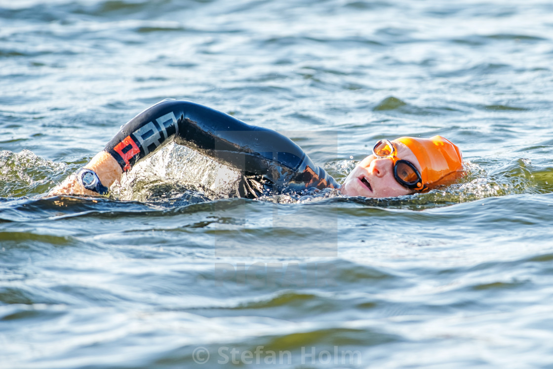 "Swimming triathlete at the Womens ITU World Triathlon event in S" by Stefan Holm - $6.32 "Swimming triathlete at the Womens ITU World Triathlon event in S" stock image