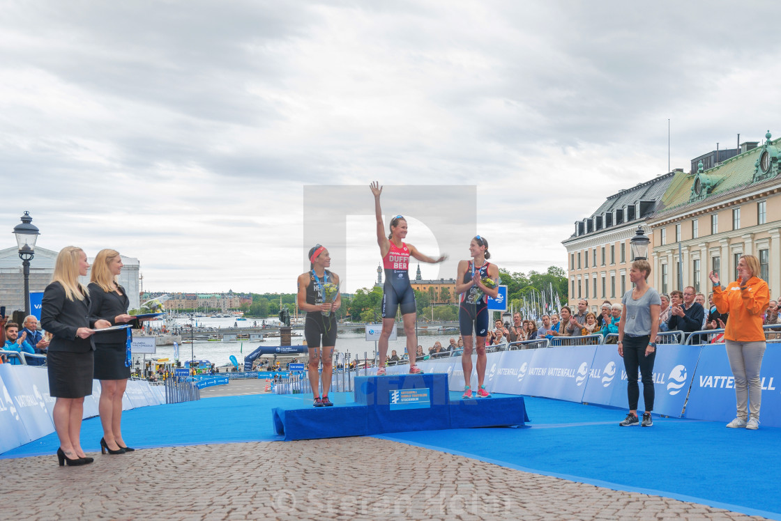 "STOCKHOLM, SWEDEN - JULY 02, 2016: Winner Flora Duffy (NZL), second Andrea Hewitt (NZL) and third Helen Jenkins (GBR) at the podium and prize cermony at the Women ITU Triathlon event in Stockholm." by Stefan Holm - $6.31 "STOCKHOLM, SWEDEN - JULY 02, 2016: Winner Flora Duffy (NZL), second Andrea Hewitt (NZL) and third Helen Jenkins (GBR) at the podium and prize cermony at the Women ITU Triathlon event in Stockholm." stock image