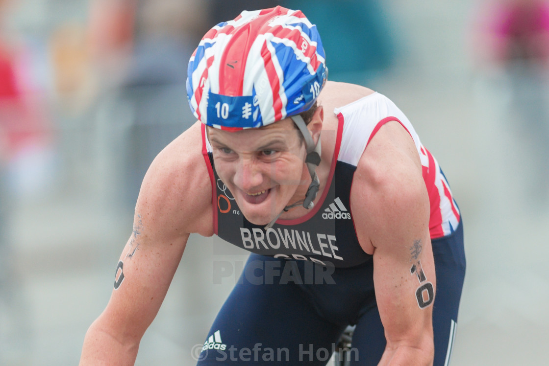 "Closeup ofAlistair Brownlee (GBR) in the cycling at the Mens ITU" by Stefan Holm - $6.35 "Closeup ofAlistair Brownlee (GBR) in the cycling at the Mens ITU" stock image
