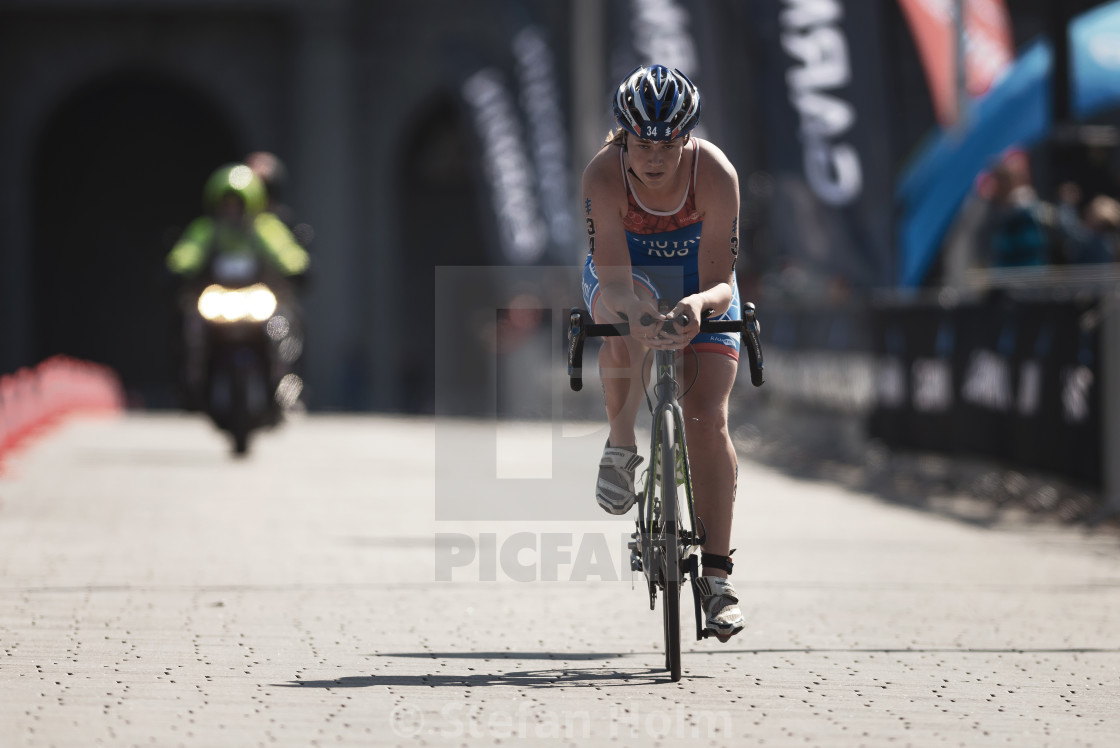 "Maria Tchulko (RUS) cycling in the womens ITU triathlon series" by Stefan Holm - $6.29 "Maria Tchulko (RUS) cycling in the womens ITU triathlon series" stock image