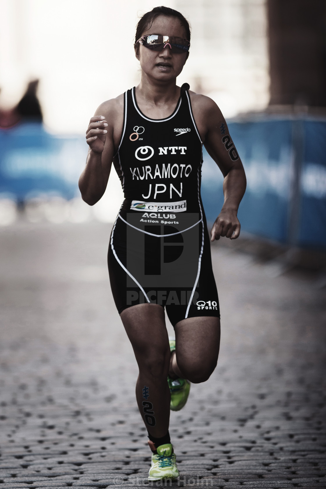 "Aoi Kuramoto (JPN) running at the womens ITU triathlon series" by Stefan Holm - $6.30 "Aoi Kuramoto (JPN) running at the womens ITU triathlon series" stock image