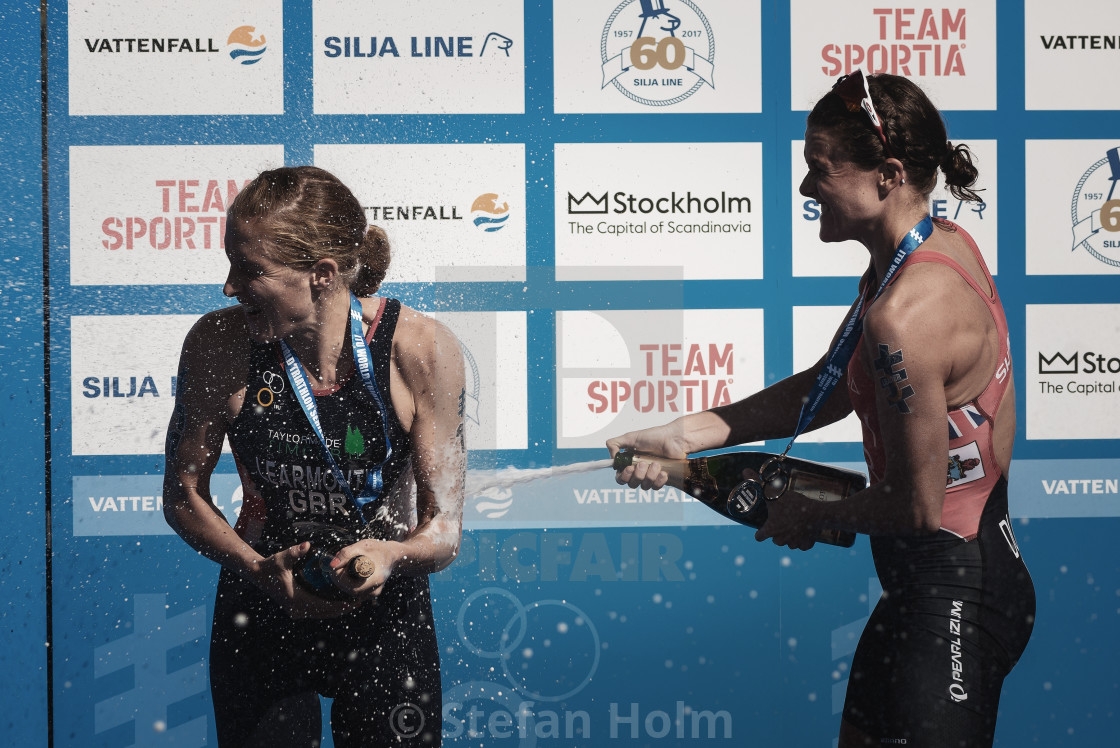 "Spraying Champagne on each other at the podium cermony at the wo" by Stefan Holm - $6.34 "Spraying Champagne on each other at the podium cermony at the wo" stock image