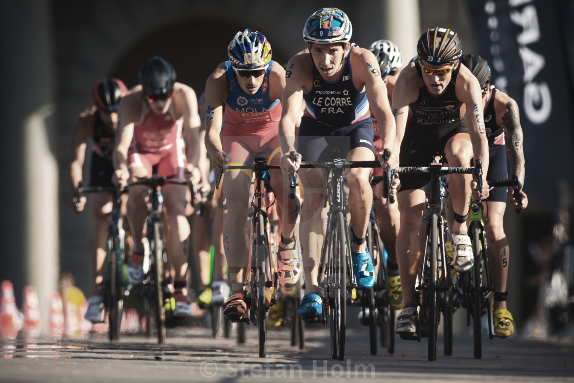 "Leading group of triathletes on bike lead by Pierre Le Corre (FR" by Stefan Holm - $6.31 "Leading group of triathletes on bike lead by Pierre Le Corre (FR" stock image