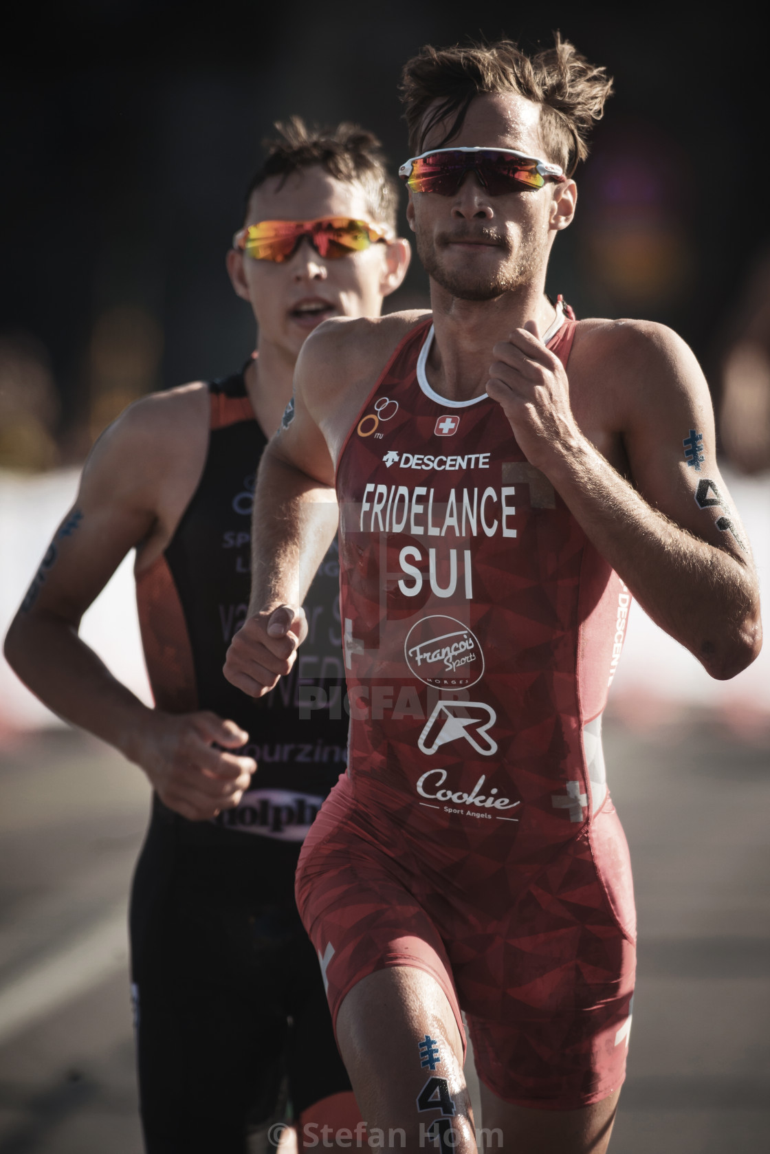 "Sylvain Fridelance (SUI) running trough the streets of the old c" by Stefan Holm - $6.32 "Sylvain Fridelance (SUI) running trough the streets of the old c" stock image