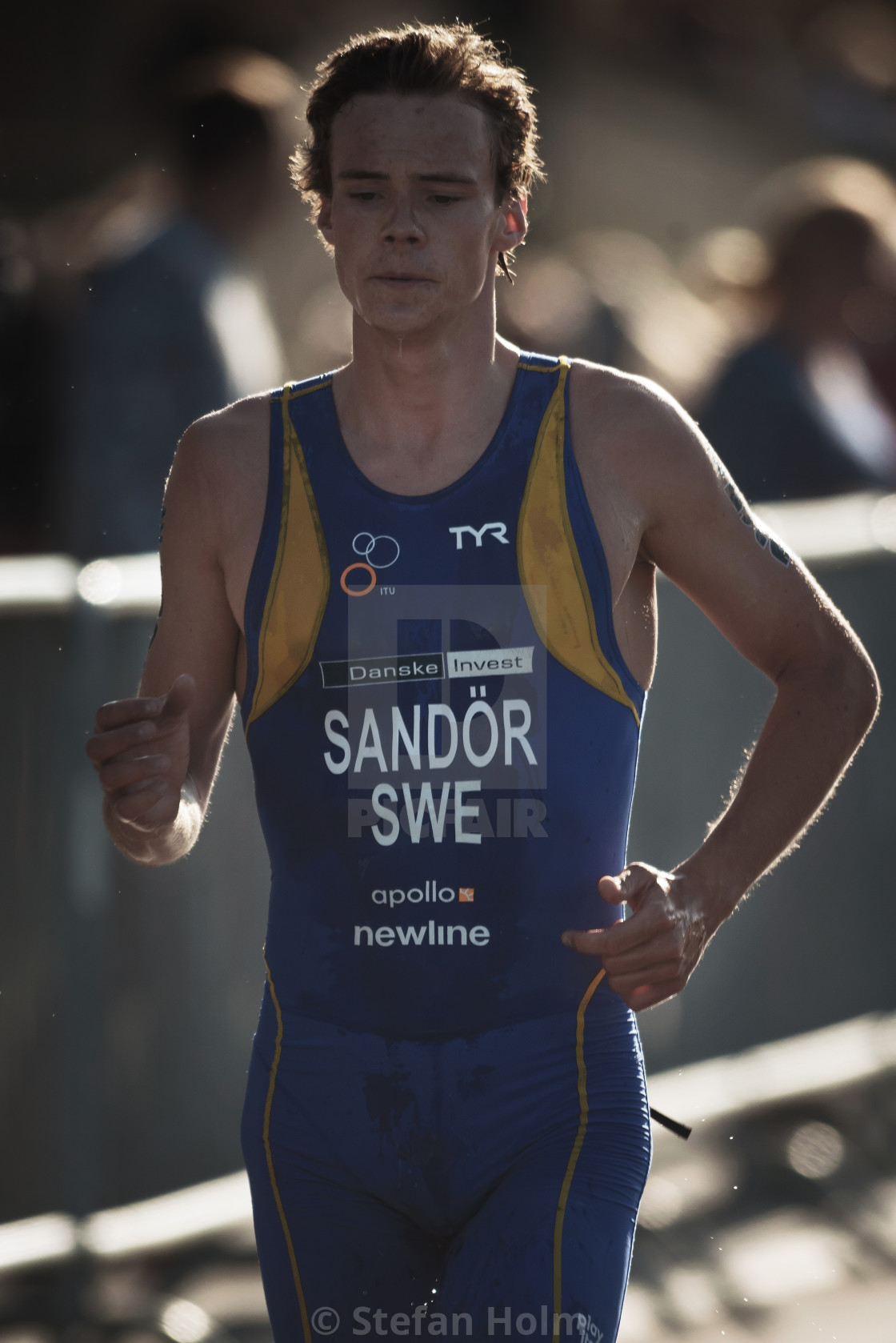 "Gabriel Sandor (SWE) running trough the waterstation at the ITU" by Stefan Holm - $6.32 "Gabriel Sandor (SWE) running trough the waterstation at the ITU" stock image
