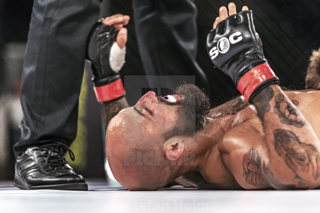 "Winner Martin Akhtar out of breath against Declan Williams at Su" by Stefan Holm - $6.32 "Winner Martin Akhtar out of breath against Declan Williams at Su" stock image
