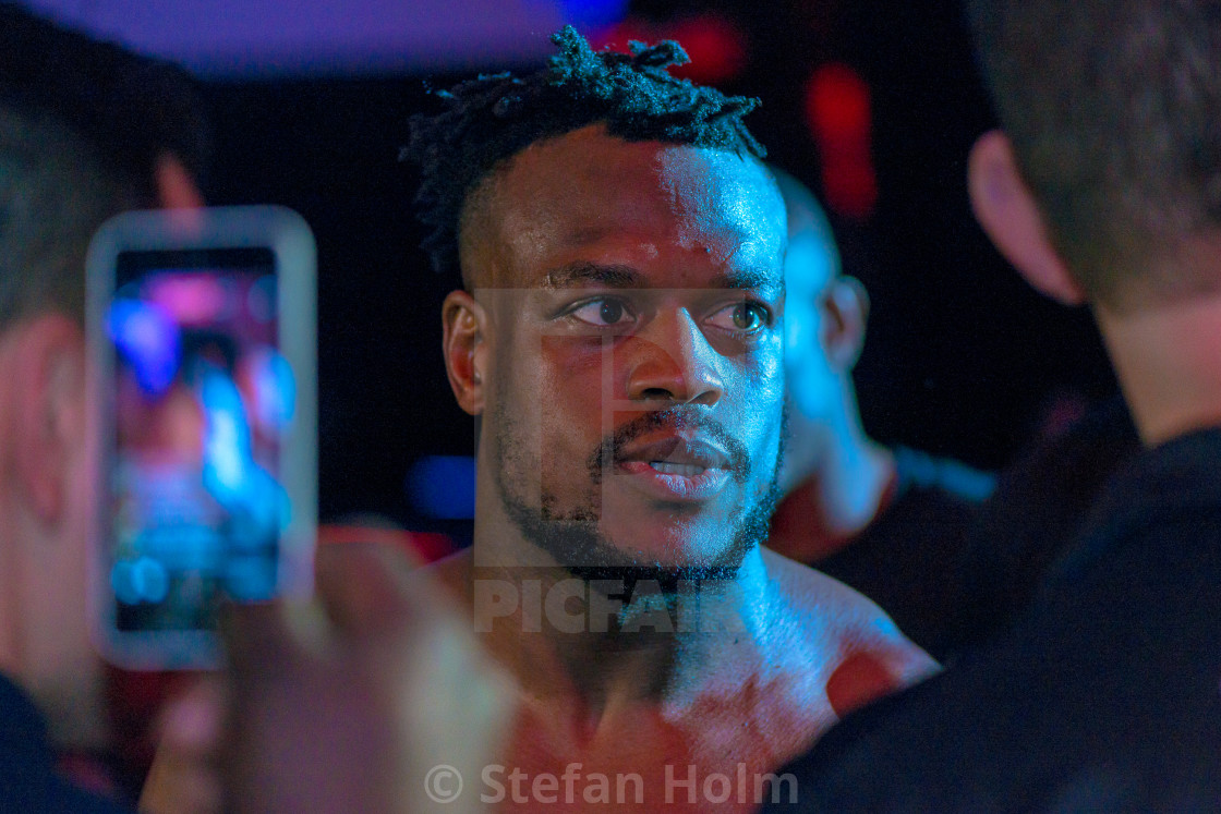 "Presentation beforfe the MMA title fight between Papy Abedi vs D" by Stefan Holm - $6.34 "Presentation beforfe the MMA title fight between Papy Abedi vs D" stock image