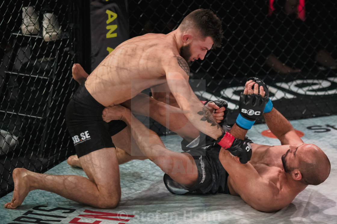 "Superior challenge 20 between Bartosz Wojcikiewicz (SWE) and Mathieu Morciano (FRA)" by Stefan Holm - $6.31 "Superior challenge 20 between Bartosz Wojcikiewicz (SWE) and Mathieu Morciano (FRA)" stock image