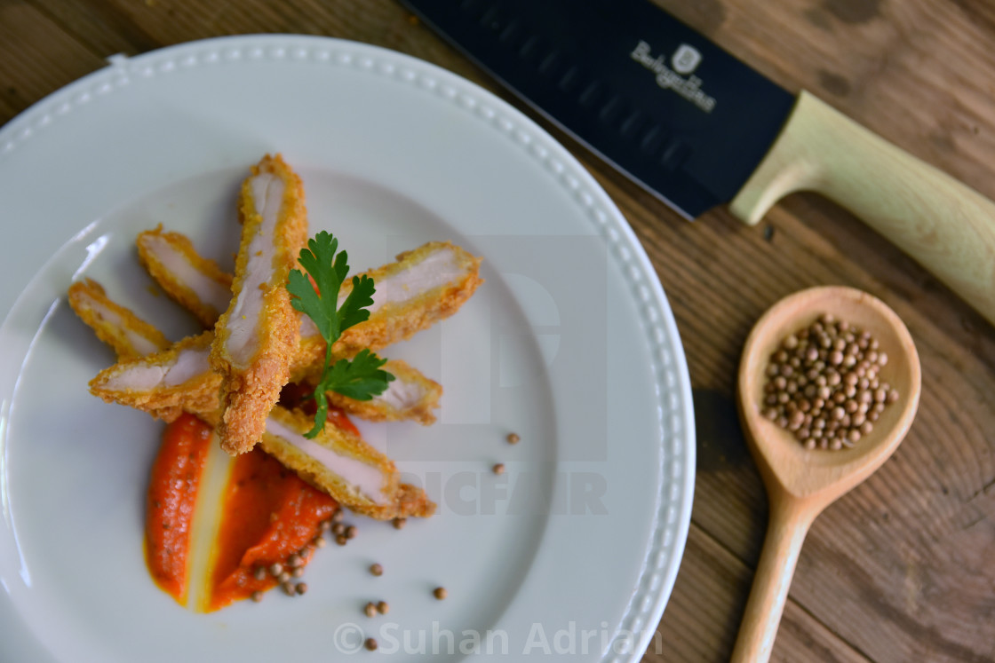 "Chicken schnitzel" by Suhan Adrian - $4.55 "Chicken schnitzel" stock image