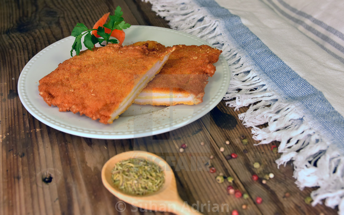 "Chicken breast stuffed with cheese" by Suhan Adrian - $4.55 "Chicken breast stuffed with cheese" stock image