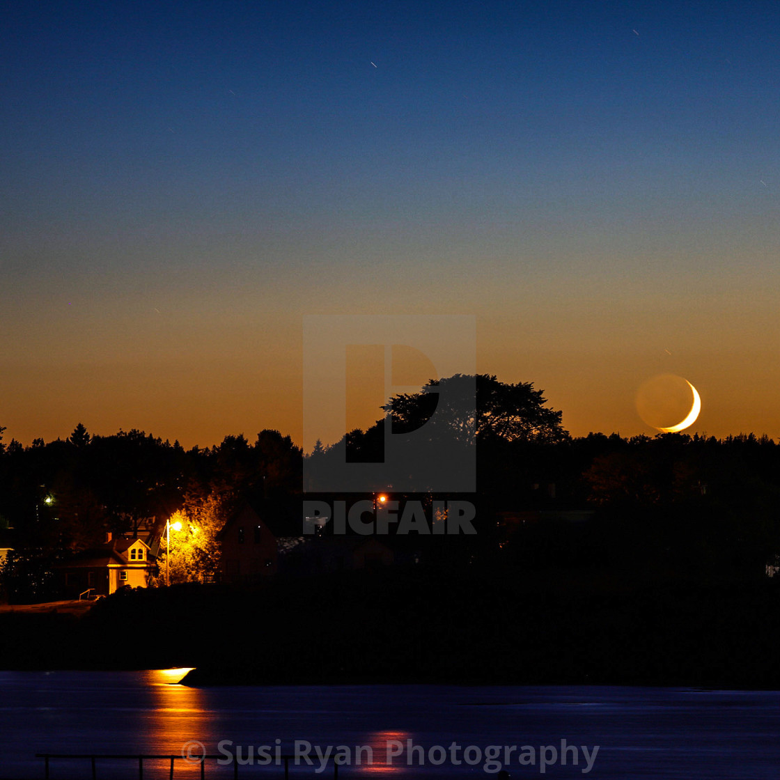 "Moon over Jonesport Maine" stock image