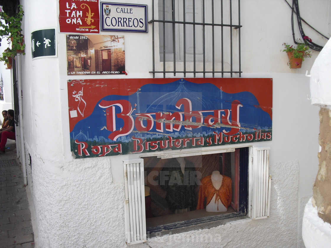 "Exterior & sign of Bombay shop, Calle Correos, Mojacar Pueblo, Almeria, Andalusia, Spain" by Ted & Jemima - $5.06 "Exterior & sign of Bombay shop, Calle Correos, Mojacar Pueblo, Almeria, Andalusia, Spain" stock image