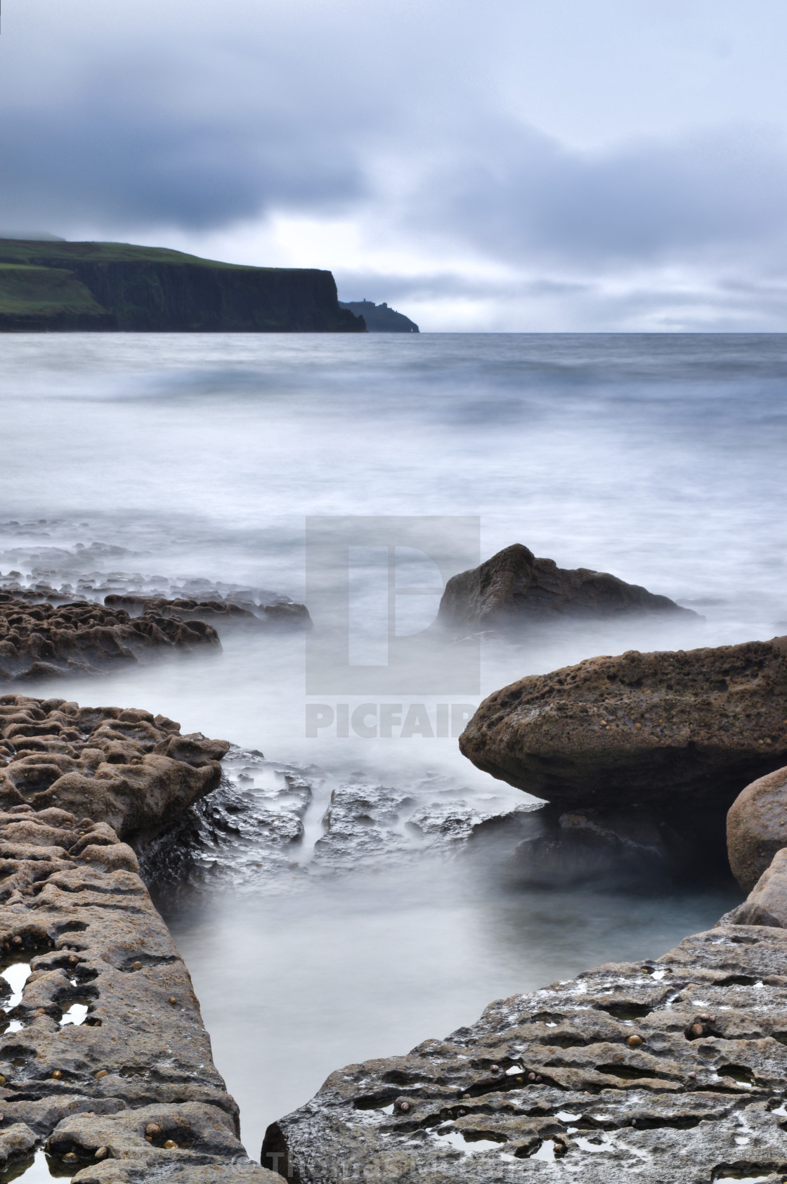 "The Cliffs of Moher as seen from Doolin Pier" stock image