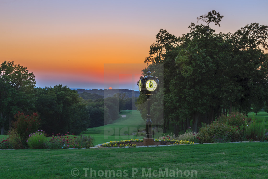 "Sun setting at Sunset Country Club" stock image