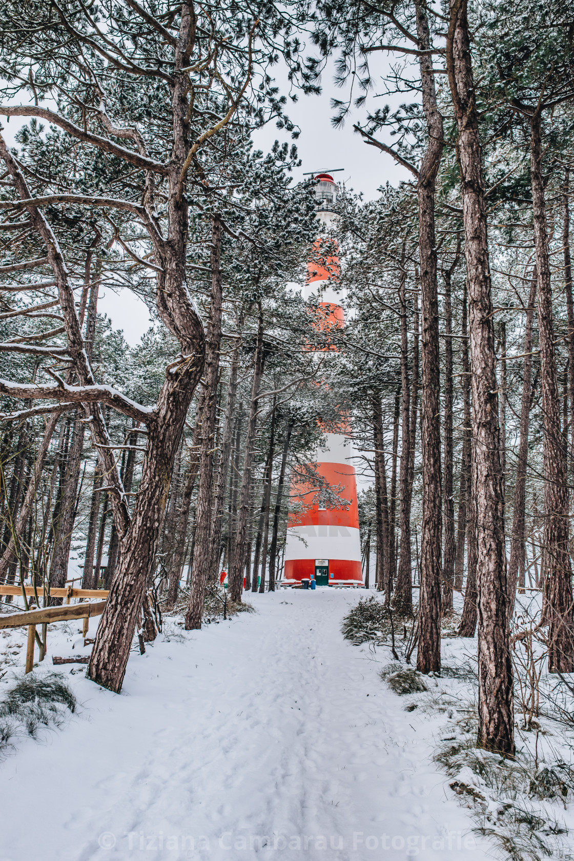 "The lighthouse in winter time in Ameland" by Tiziana Cambarau Fotografie - $54.91 "The lighthouse in winter time in Ameland" stock image