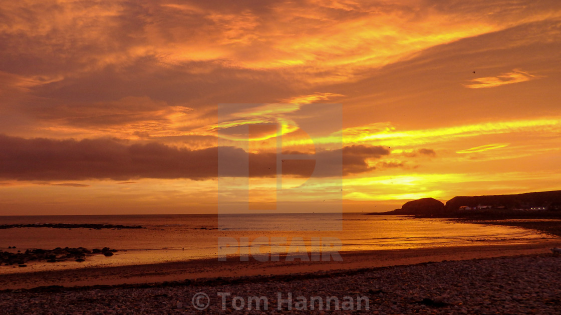 "Stonehaven Bay Sunrise" by Tom Hannan - $15.81 "Stonehaven Bay Sunrise" stock image