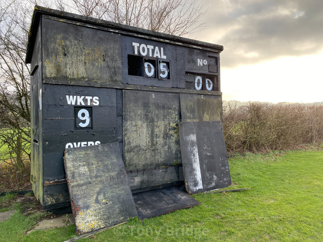 "Old cricket scoreboard" by Tony Bridge - £20.00 "Old cricket scoreboard" stock image