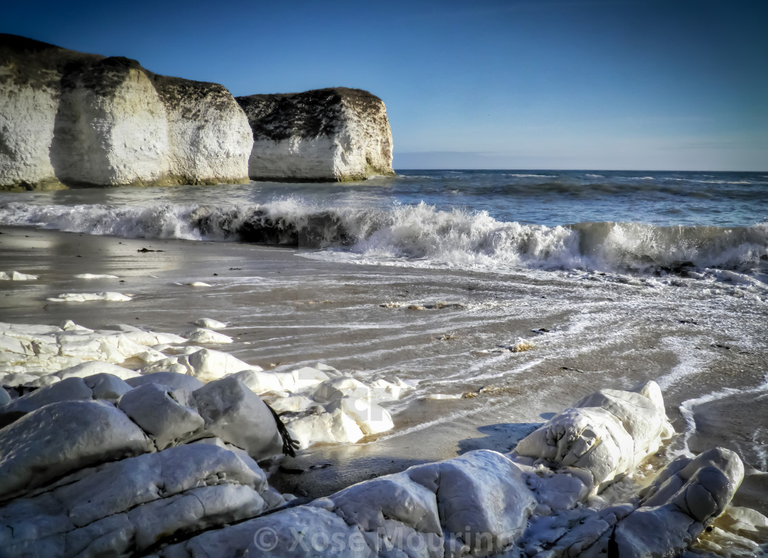 "Crashing waves at Flamborough Head." stock image