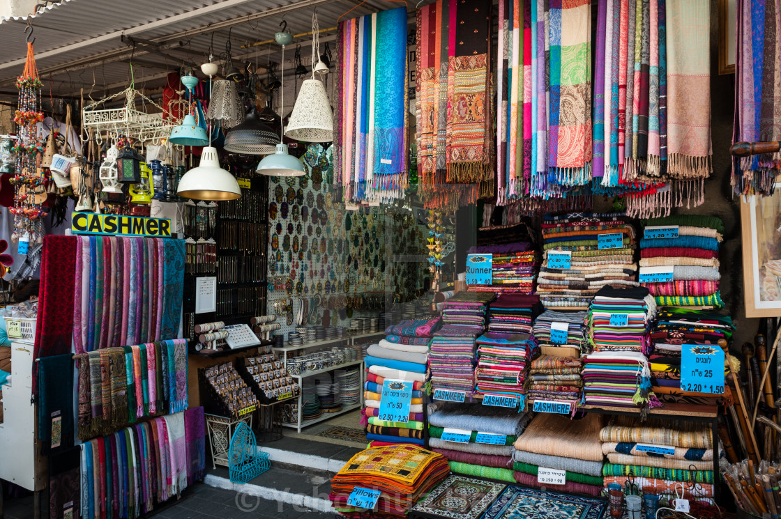 "Colored scarves on sale at the Jaffa flea market" by Yehoshua Halevi - $9.12 "Colored scarves on sale at the Jaffa flea market" stock image