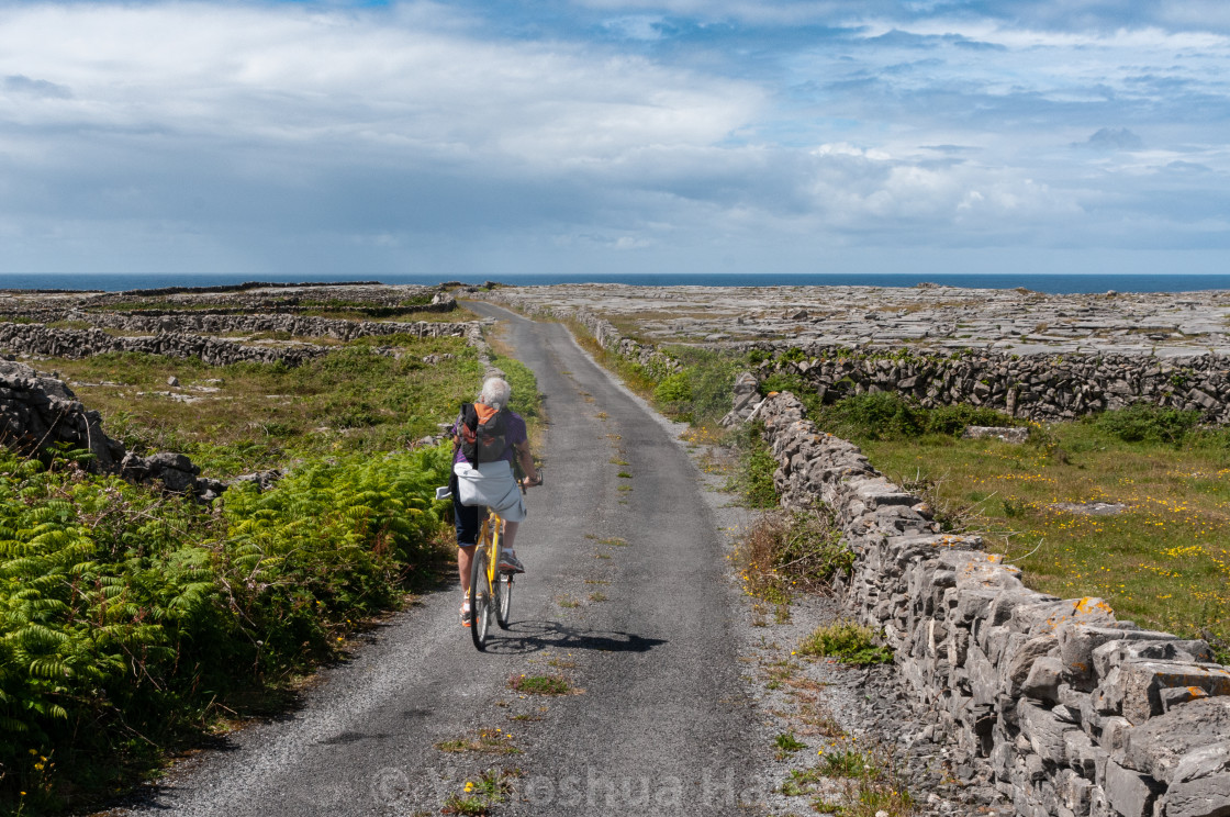 "Irish island bike rider" by Yehoshua Halevi - $6.11 "Irish island bike rider" stock image