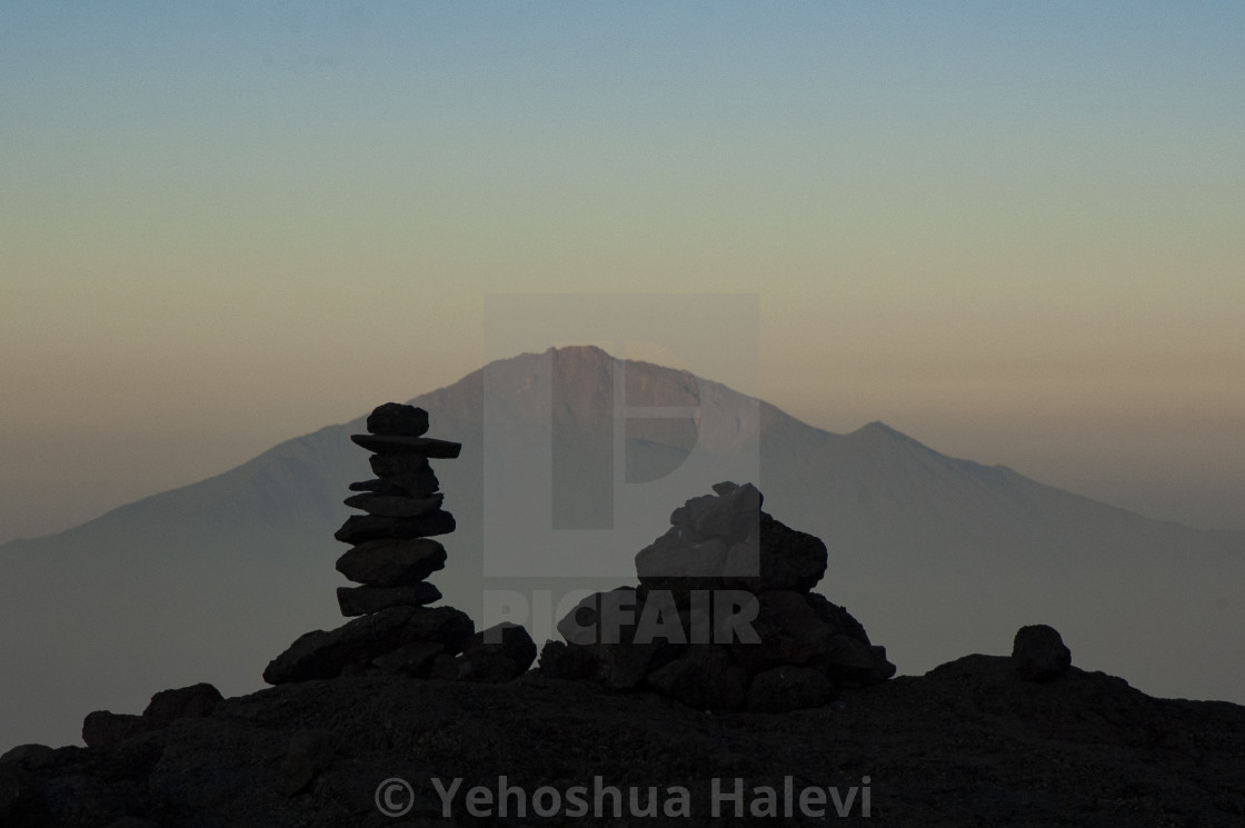 "Rockpile and Mt. Meru, Tanzania" by Yehoshua Halevi - $6.08 "Rockpile and Mt. Meru, Tanzania" stock image