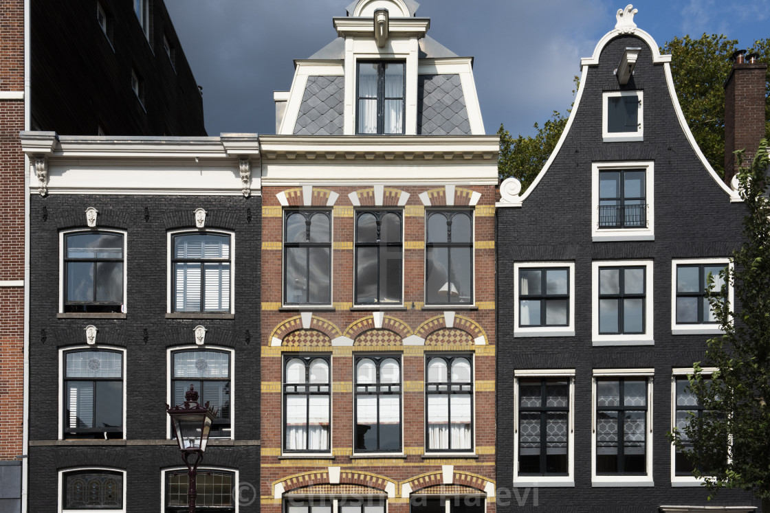 "Apartment buildings and windows in Amsterdam" by Yehoshua Halevi - $6.08 "Apartment buildings and windows in Amsterdam" stock image