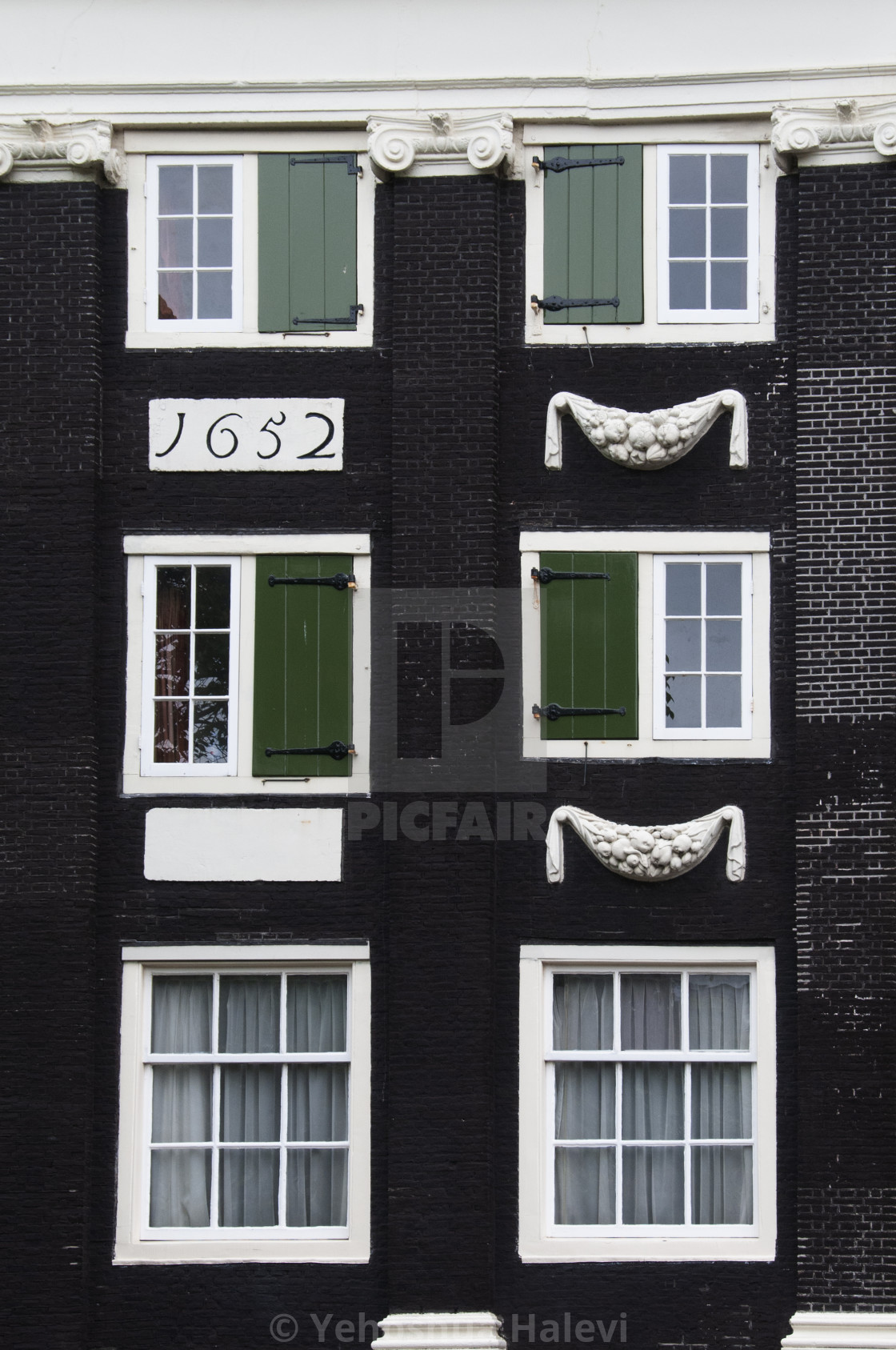 "Detail of an Amsterdam apartment building" by Yehoshua Halevi - $6.08 "Detail of an Amsterdam apartment building" stock image